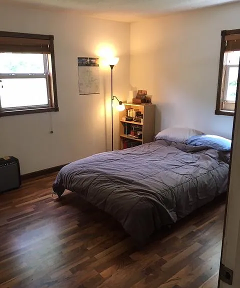 bedroom 1 with wood flooring and good size closet,