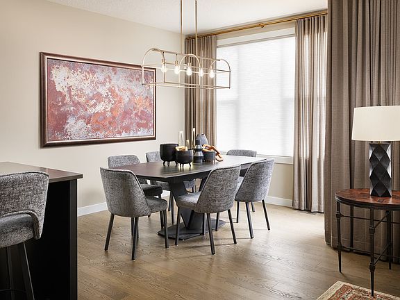 Dining room of the Robson 26 model home by Brookfield Residential