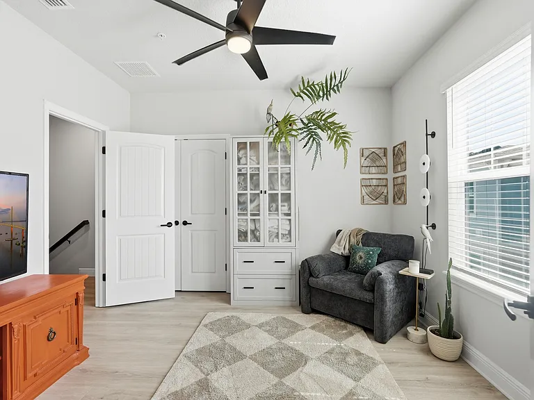 2nd bedroom on 3rd floor with ensuite full bathroom. Could also bee a wellness space or office.