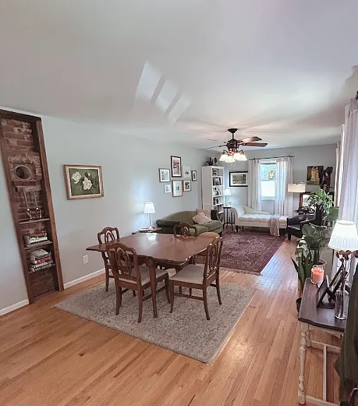 Open-format dining and living room space.