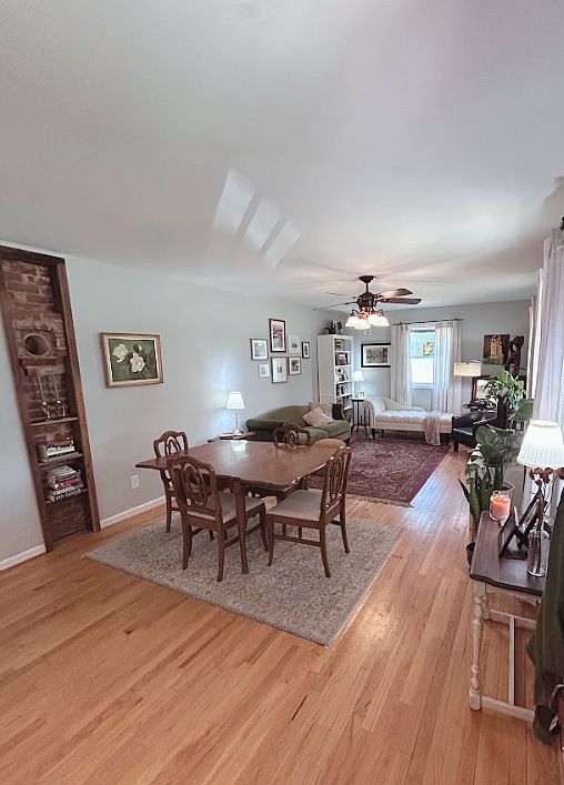 Open-format dining and living room space.