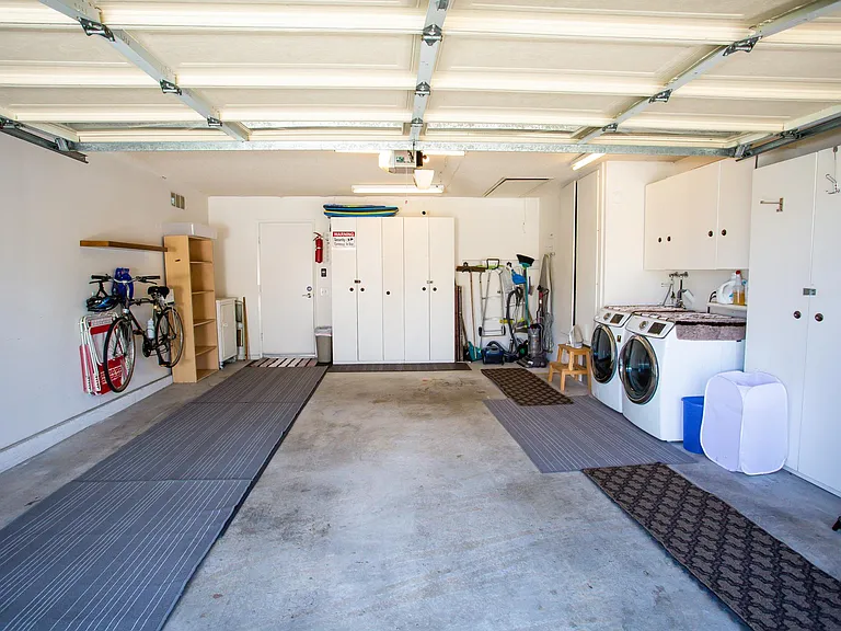 Garage will hold one car plus storage, other car in driveway