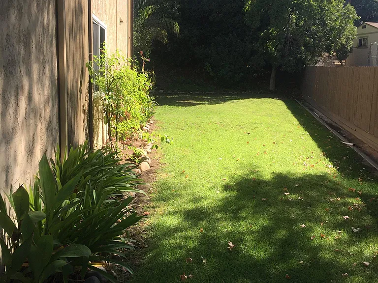 Side yard that runs the length of the condo. Rarely used. Ultra quiet and private. No homes visible. No prying eyes.