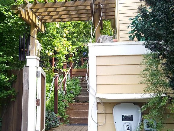 Electric Car Charging Station at top of driveway and North Gate