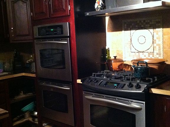 3 ovens with 2 cooktops
