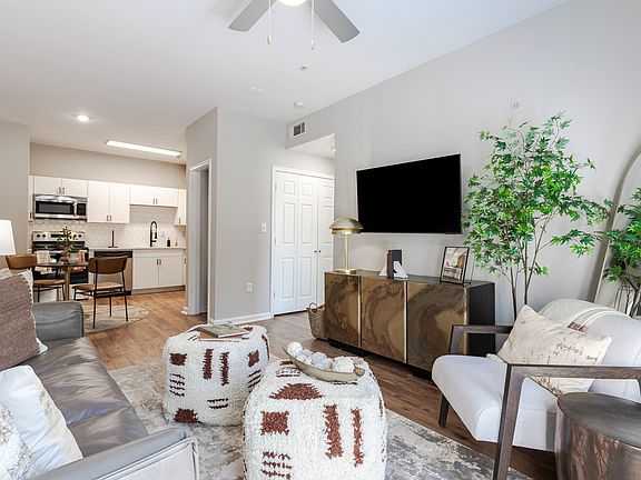 Newly Renovated Living Room with Hardwood-Style Flooring