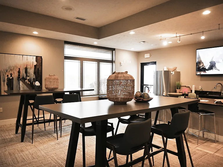 Community kitchen and tabels in the clubhouse at The Sterling.