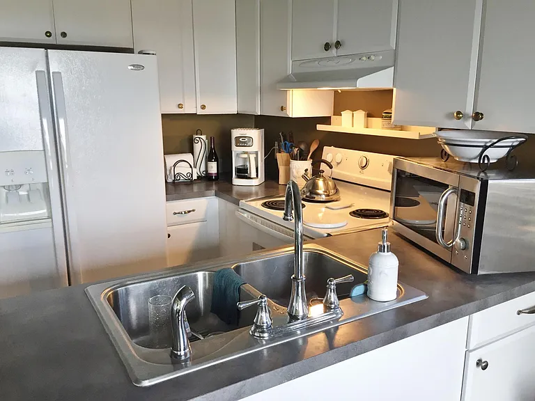 Kitchen pass-through to Dining area.