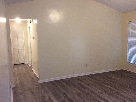 Living room looking into hallway where bedrooms are located