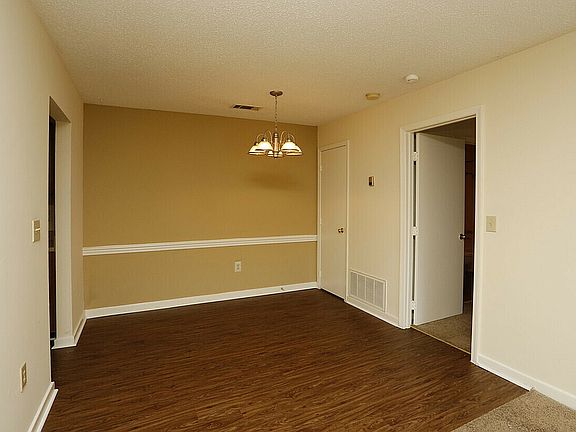 Experience intimate dining in this charming nook with beautiful flooring and ambient lighting.