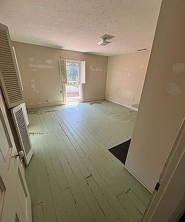 Upstairs Bedroom w/ faux FP