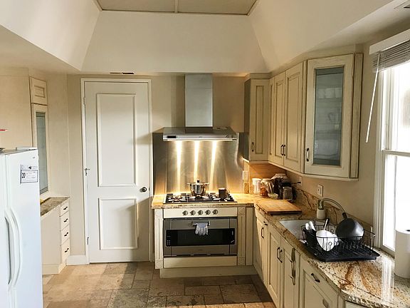 Shared kitchen area with Gaggenau range and oven, dishwasher