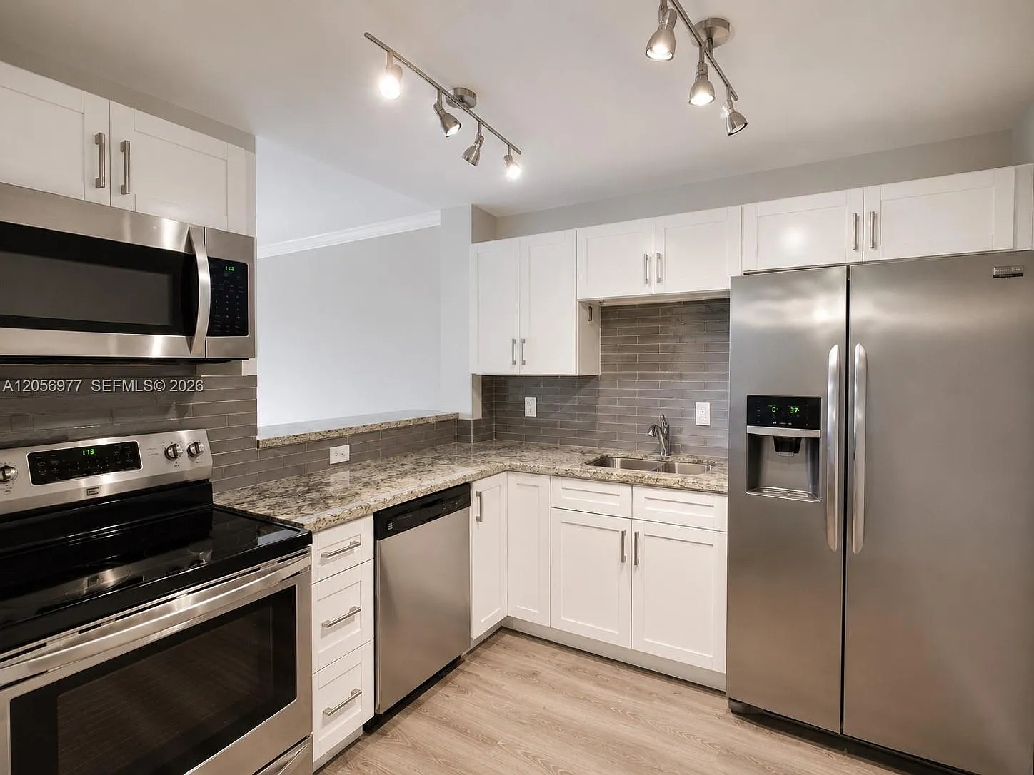 Middle River Tower Condo — Photo 1