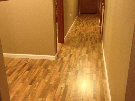 Hallway w/ laminate flooring