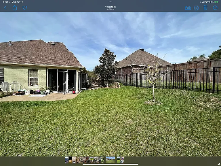 Large level Fenced backyard.
