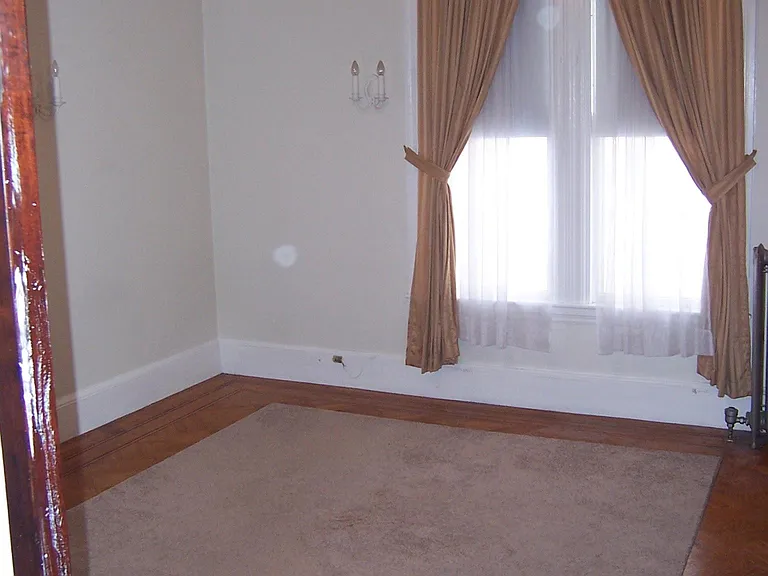 Bedroom with carpet