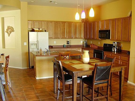 Large eat in kitchen with upgraded maple cabinets!