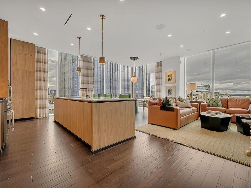 Sweeping city and river views on 2 sides you enter from the foyer