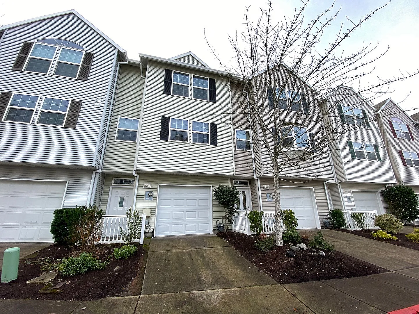 Fantastic Townhome with Gas Fireplace, Deck, Fenced Yard, and Vaulted Ceilings — Photo 1