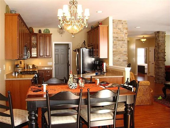 VIEW FROM SUNROOM INTO KITCHEN AREA