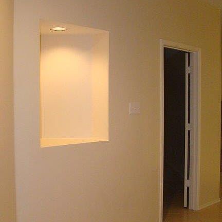 Appreciate the easy maintenance of this home with recent tile throughout! Lovely architectural niche