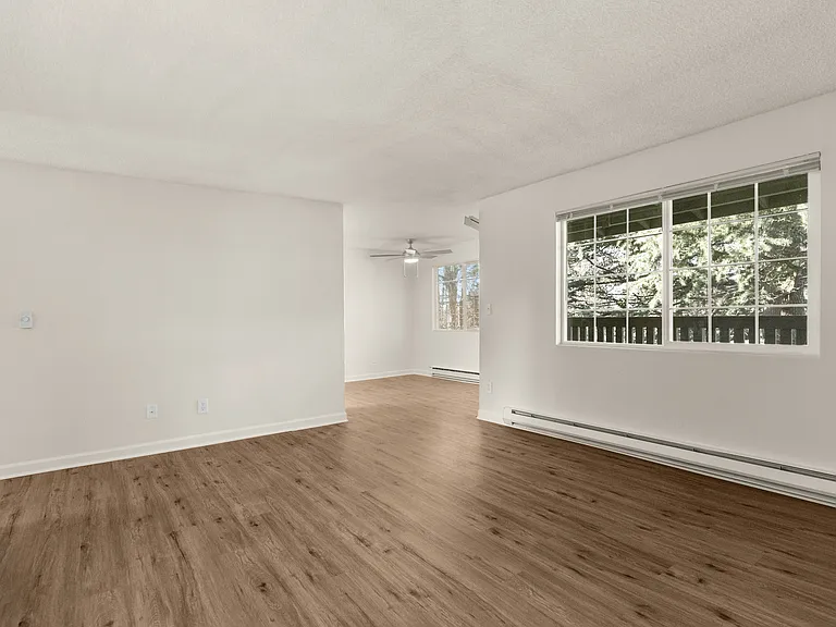 Experience the elegance of this modern living area with natural light pouring in. Experience the elegance of this modern living area with natural light pouring in.