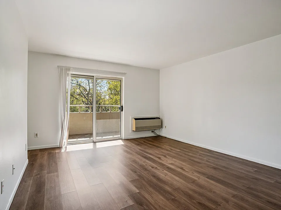 Enjoy indoor-outdoor living with sliding glass doors leading to your private balcony, professionally operated by Highlands Vista Group.