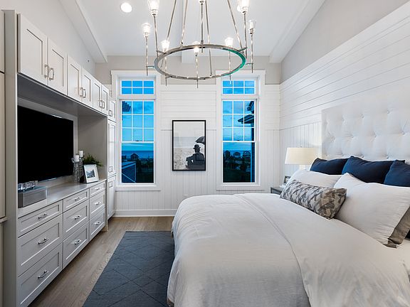 Primary bedroom suite with walk-in closets