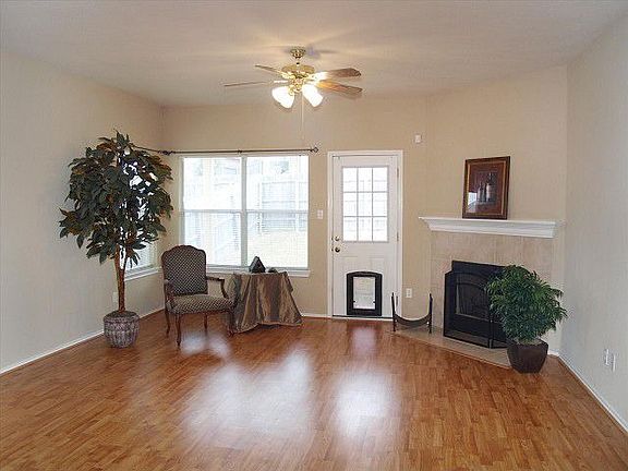 Upgraded Flooring and Lighting Throughout!  Wood Burning Fire Place