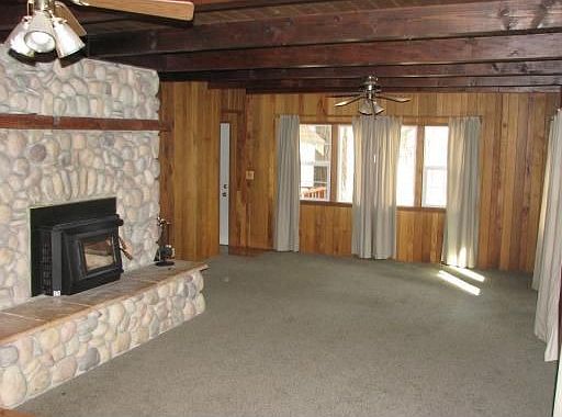 Living Room with river rock fireplace