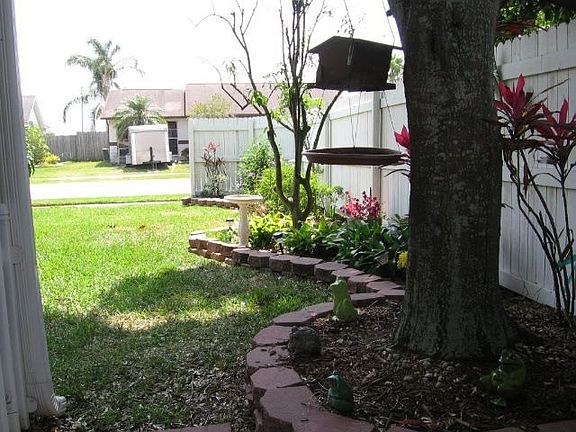 Shadey back yard with swing.