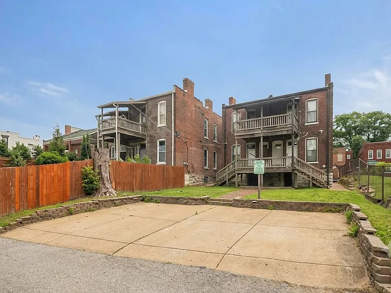 Free off street parking included! Green space for grilling, gardening, or relieving your pup