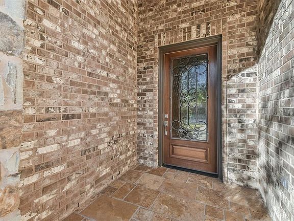 Large front door entryway with stunning tilework!