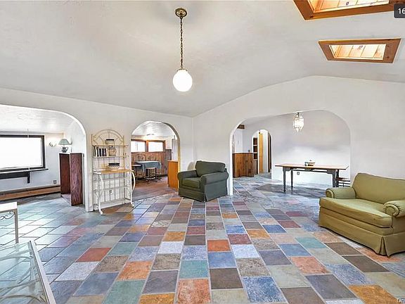 Living area with Bonus Room. Lots of Light Italian tile floors