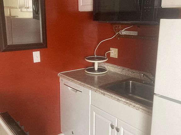 From the dining, living area into right side of kitchen