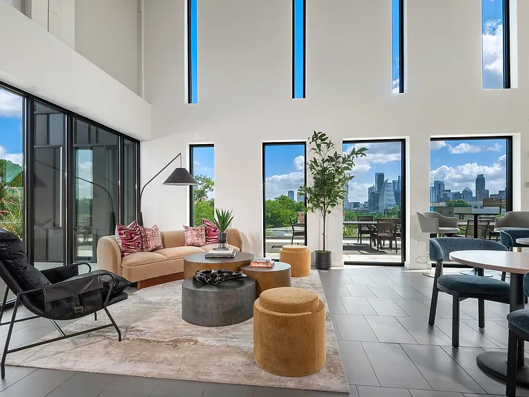 Resident Clubhouse with Downtown Views, Lounge Areas, and Entertainment Kitchen