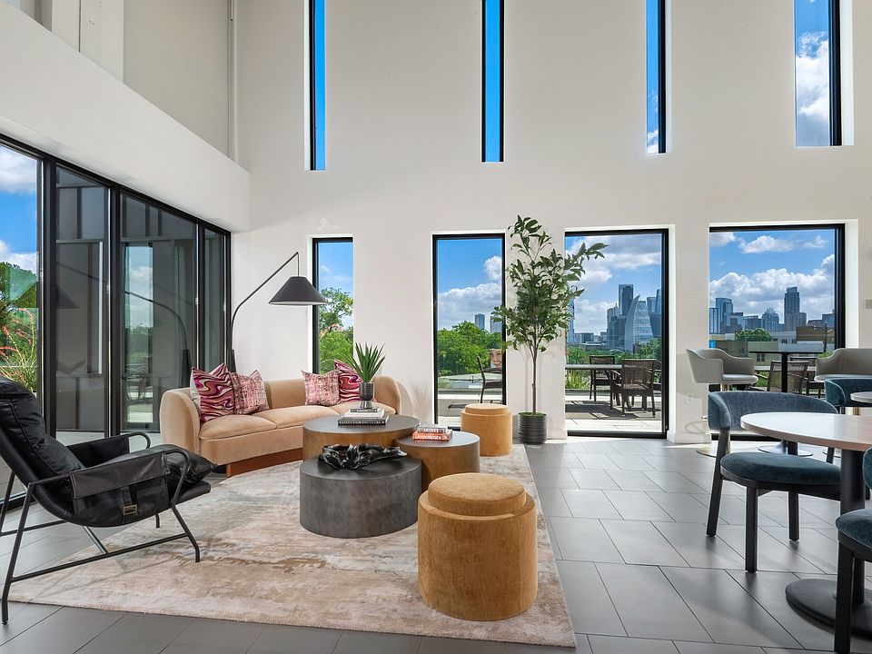 Resident Clubhouse with Downtown Views, Lounge Areas, and Entertainment Kitchen