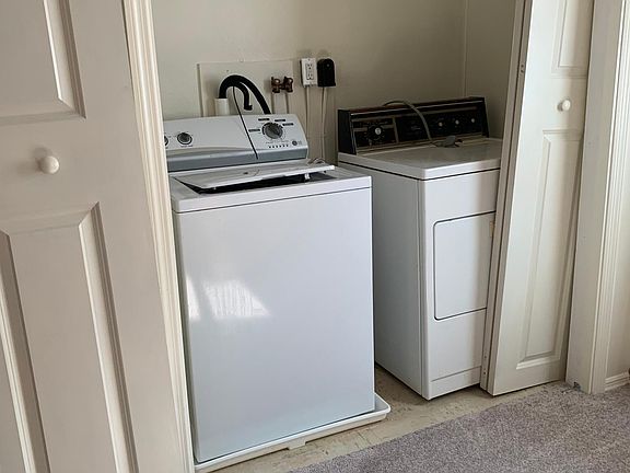 Bedroom 3 has washer and dryer in a closet. Roomy enough for bedroom furniture.