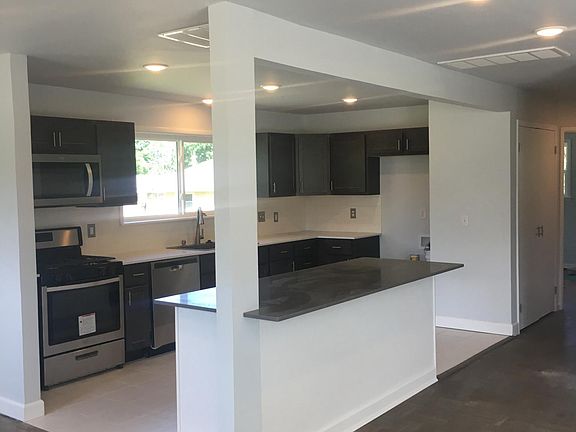 OPEN FLOOR PLAN WITH CENTER ISLAND