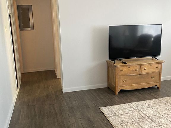 Hall into bedroom and bathroom