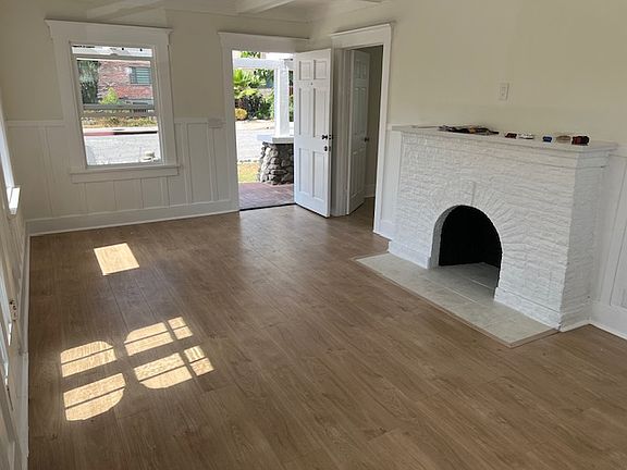 Front entrance door from the living room (Fire place for looks only not functional)