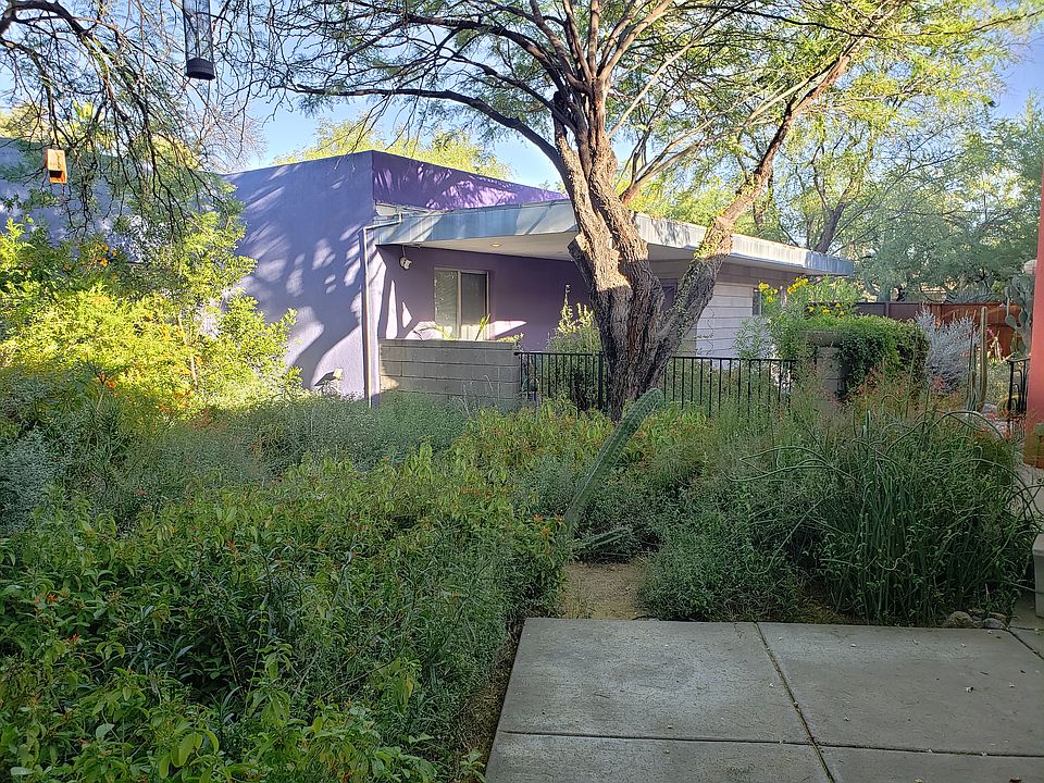 A view of the Furnished Guesthouse from the central courtyard garden.