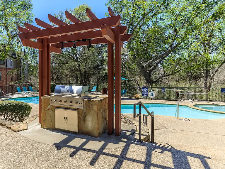 Scenic Picnic Area with Barbecue at The Woods of Five Mile Creek in Dallas, TX