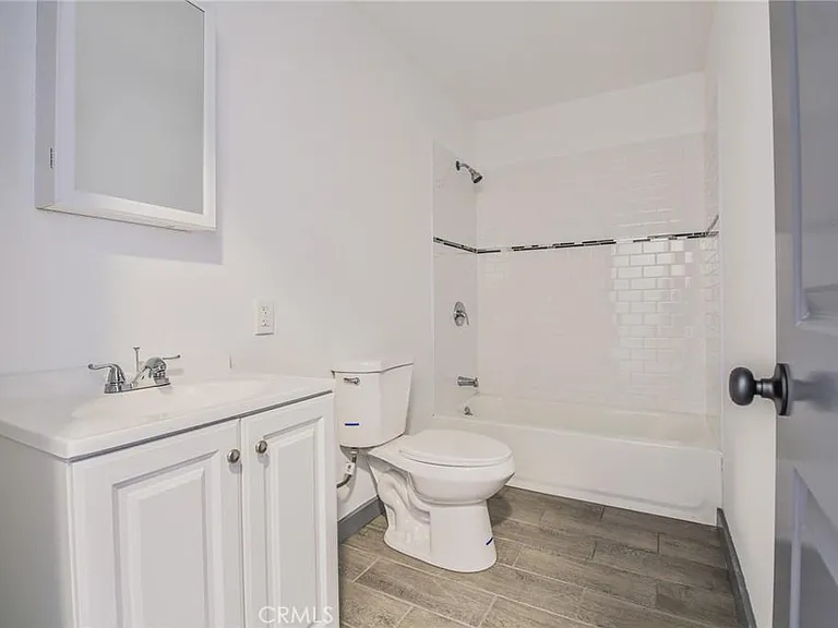 Main bathroom: new tile, curbless shower.