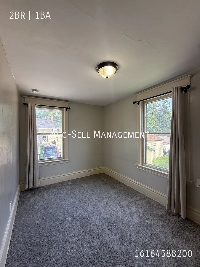 Beautiful 2BR/1BA Upper Apartment at 205 Valley NW #4, Grand Rapids, MI 49504 — Photo 4