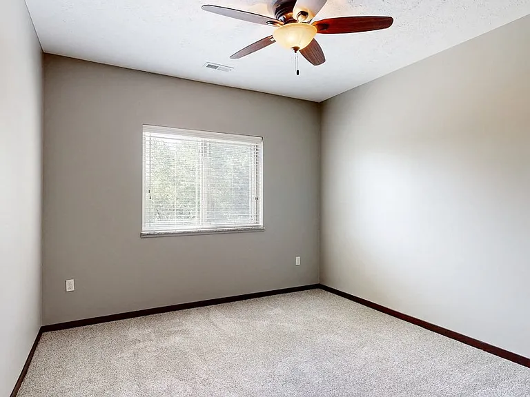 Our spacious bedrooms are filled with natural light.