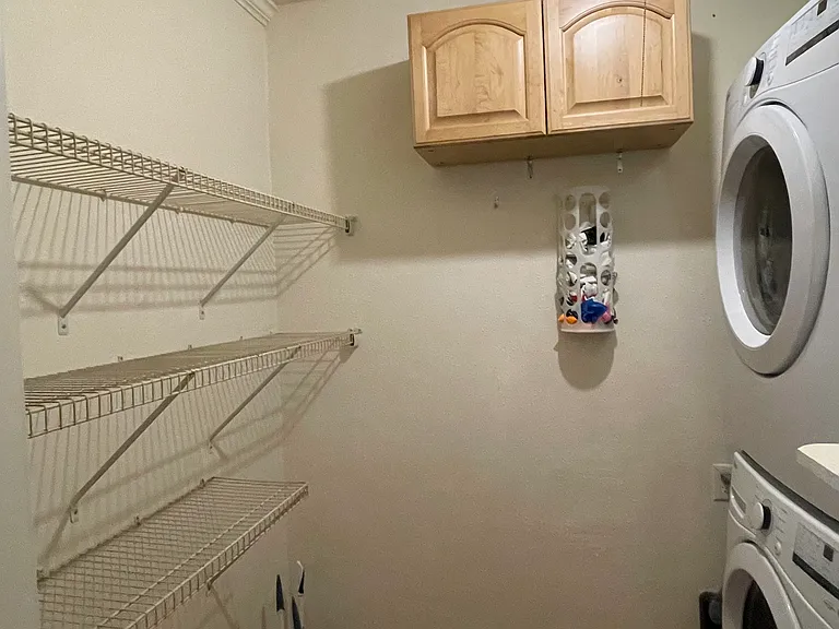 Pantry with washer/dryer.