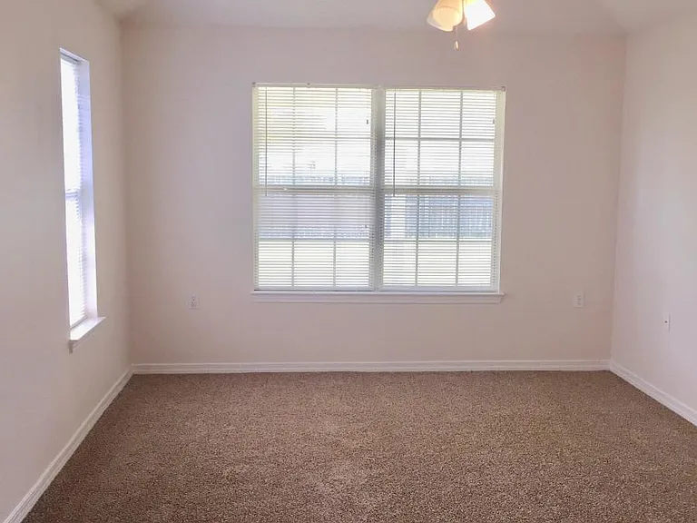Large Master bedroom with lots of natural light