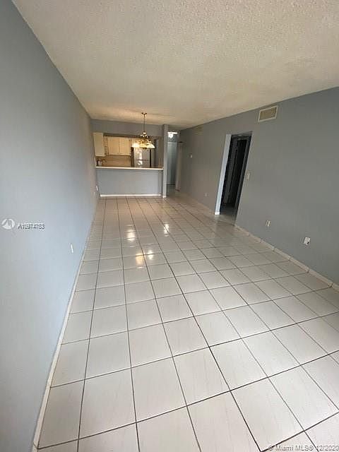 1st image of 6095 W 19th Ave APT 403