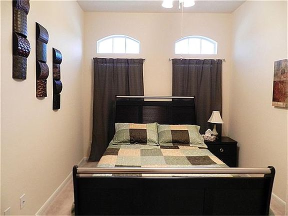 This secondary bedroom is at the front of the house.
